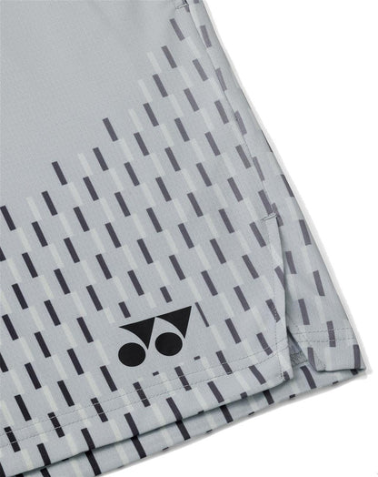 Close-up of Yonex 15241EX Knit Men's Tennis Shorts in Silver Grey, featuring geometric dark gray lines and a black Yonex logo, designed for moisture-wicking performance.