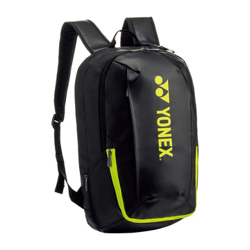 The Yonex 82412EX Active Tennis Backpack in Black/Lime features multiple zippered compartments, including a front pocket and main section, a separate shoe compartment, sturdy straps, and a padded back for comfort.
