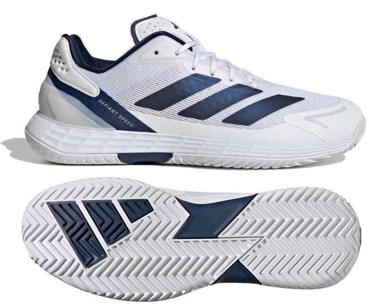 The adidas Defiant Speed 2 Men’s Tennis Shoes in white and navy feature “DEFIANT SPEED” on the side, navy blue accents and stripes, and a textured grip sole with navy details. Shown from side and bottom views.