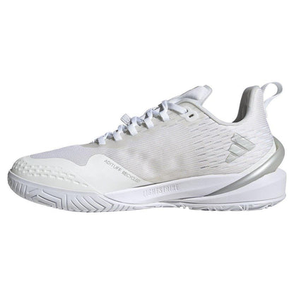 Introducing the adidas Adizero Cybersonic Women's Tennis Shoes in White/Silver: crafted for swift movements, these sneakers feature a textured sole, sleek side logo, light striping details, and a convenient pull tab at the heel. Designed with modern aesthetics and a slightly elevated heel for enhanced style.