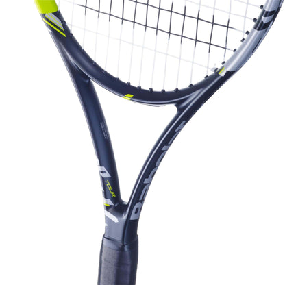 Close-up of a Babolat Pulsion Tour Tennis Racket - Black, showcasing its black and neon yellow color scheme with the Babolat brand name partially visible. The racket features tightly strung strings for enhanced power and a black-wrapped grip. Its design highlights sleek curves and vibrant accents.