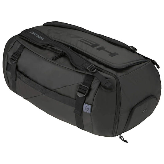 Introducing the HEAD Pro X Tennis Duffle Bag XL in black, an eco-conscious tennis bag designed with a spacious main compartment, multiple straps for convenience, and side pockets for additional storage. The bag prominently displays the HEAD brand name.