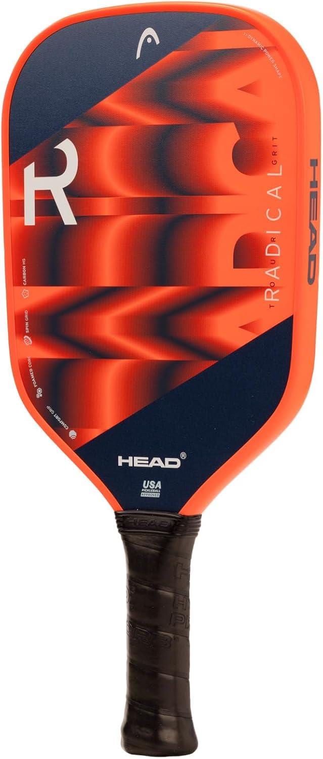 The HEAD Radical Tour Grit 2024 Pickleball Paddle in orange and navy features bold geometric patterns, a black textured grip handle, and enhanced durability with Toray T700 Carbon Fibers.