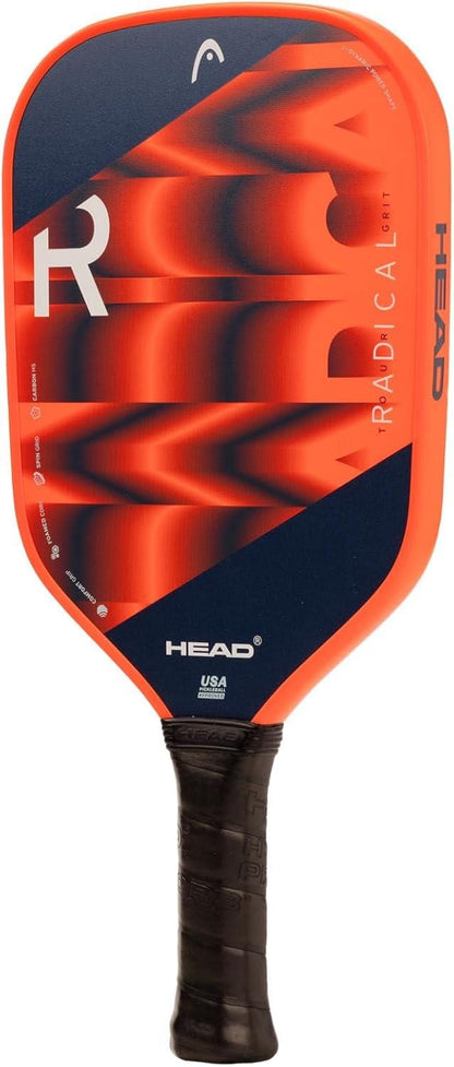 The HEAD Radical Tour Grit 2024 Pickleball Paddle in orange and navy features bold geometric patterns, a black textured grip handle, and enhanced durability with Toray T700 Carbon Fibers.