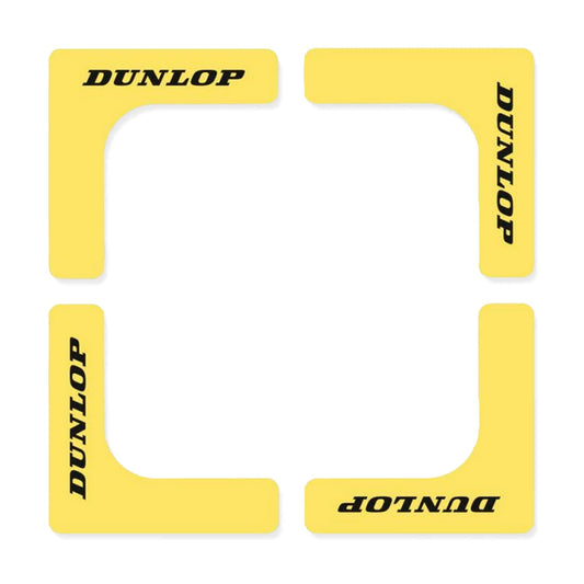 Dunlop Tennis Court Edge - Yellow (8 Pack) vibration dampeners, crafted in the shape of corner brackets from non-slip rubber, are arranged to form a square and feature the Dunlop brand name printed in black on each piece.