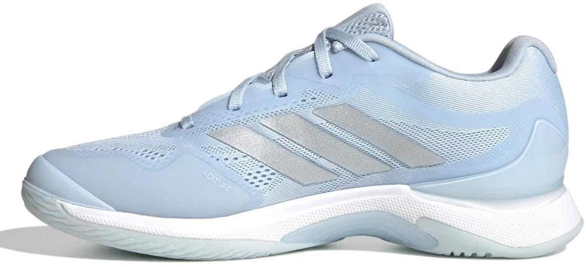 An adidas Avacourt 3 women’s tennis shoe in Crystal Sky, Silver Metallic, and Cloud White, featuring a breathable mesh upper, lace-up closure, white sole, and shown from the left side.