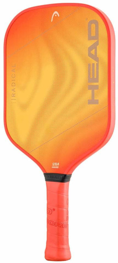 The HEAD Radical XCEED 2026 Pickleball Paddle is bright orange with a red handle, "HEAD" in large gray letters on the right edge, and features a 13mm thin fibreglass composite core for durability.