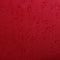 Close-up of burgundy water-resistant fabric on the Babolat Court XS 3 Racket Tennis Bag - Burgundy / Black, with scattered water droplets beading on the surface, highlighting the compact Babolat bag's waterproof texture.