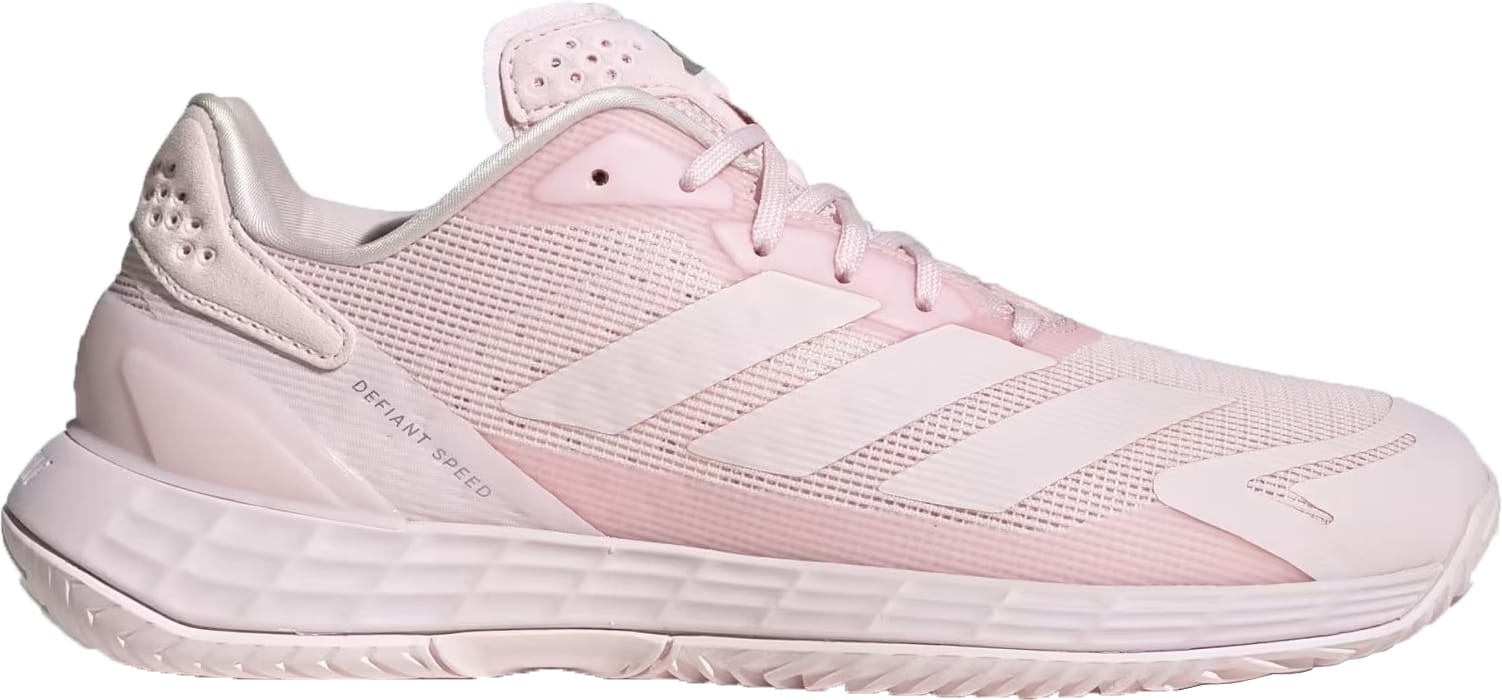 Introducing the adidas Defiant Speed 2 Women’s Tennis Shoes in Distilled Pink—a stylish sneaker featuring a mesh upper, classic lace-up design, and signature three stripes along the side. These lightweight court shoes showcase crisp white accents and the “DEFIANT SPEED” text emblazoned midway on the shoe’s side. Designed for comfort with a cushioned sole, they’re an ideal choice for women who want both performance and flair in their tennis footwear lineup.