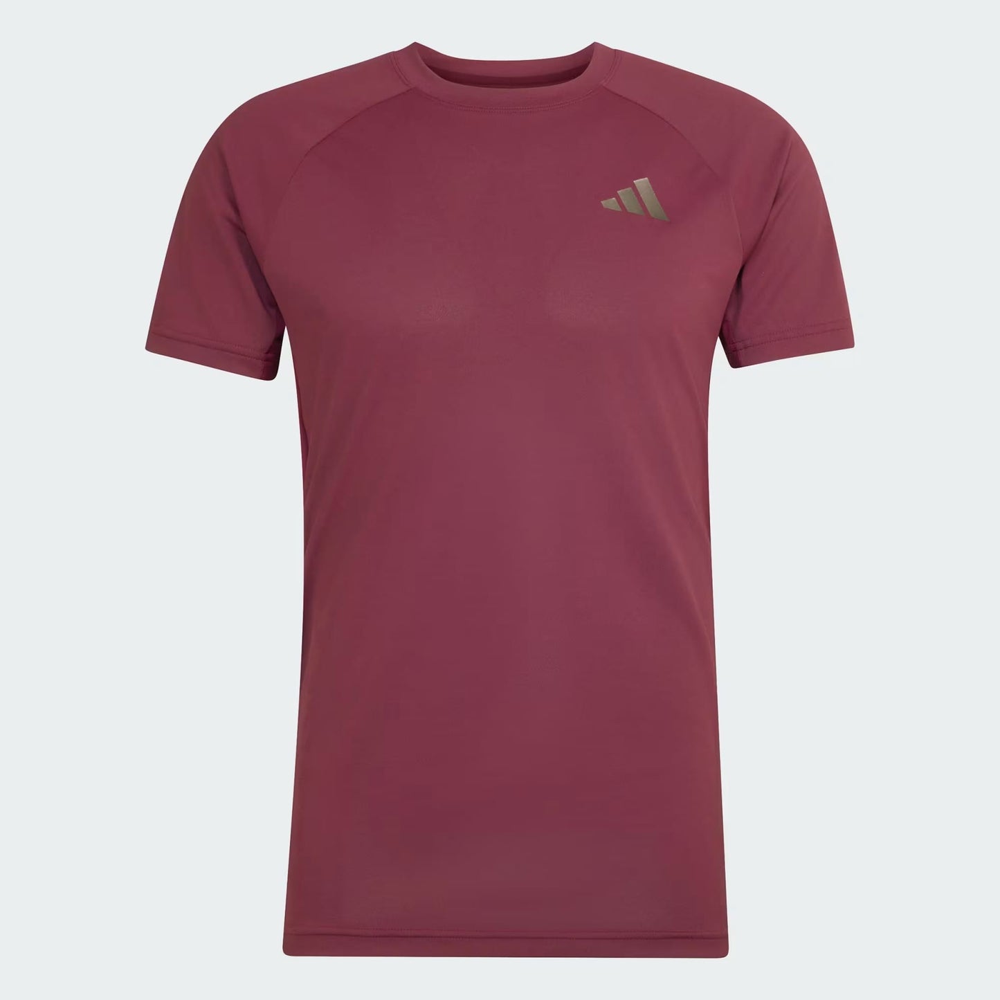 The adidas Climacool+ Freelift Pro Men’s Tennis T-Shirt in maroon features a small, light-colored adidas logo on the left chest and is shown against a light gray background.