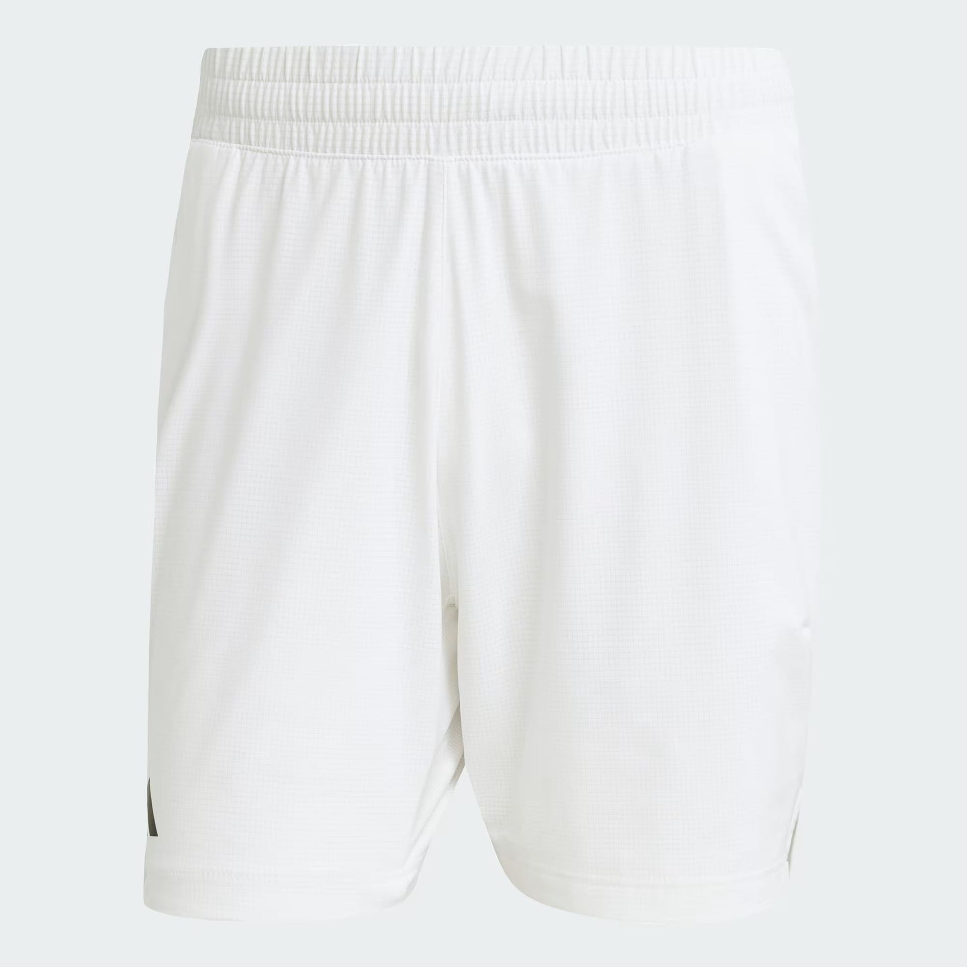 The adidas Climacool Ergo Men's Tennis Shorts in white feature a subtle textured pattern, four-way stretch, and an elastic waistband for comfort and mobility. Shown against a light gray background.