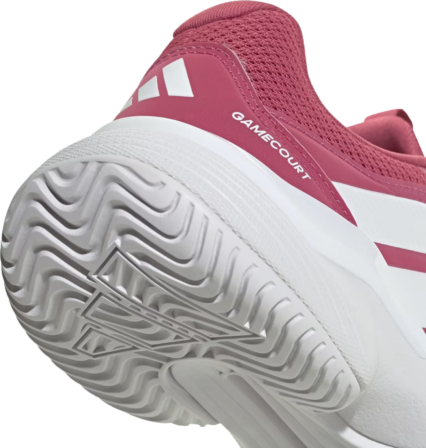 A close-up of the adidas GameCourt 3 Women's Tennis Shoes in Dual Magenta and Cloud White highlights the textured sole and the "GAMECOURT" label near the heel.
