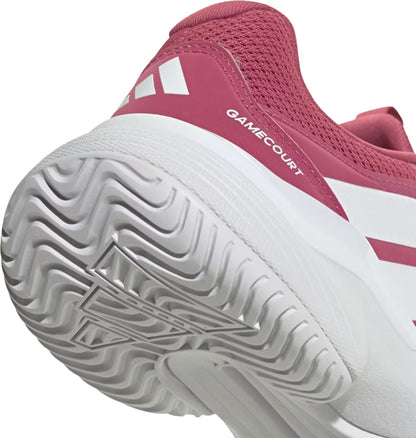A close-up of the adidas GameCourt 3 Women's Tennis Shoes in Dual Magenta and Cloud White highlights the textured sole and the "GAMECOURT" label near the heel.