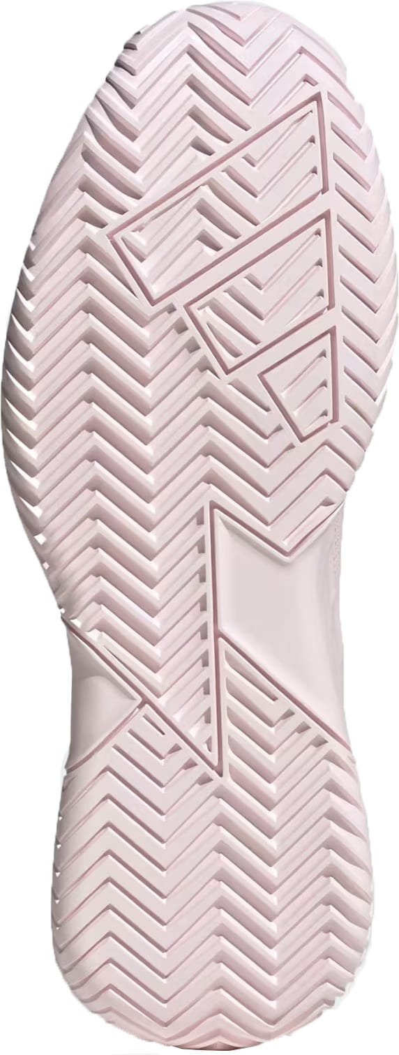 Close-up of the sole from the adidas Defiant Speed 2 Womens Tennis Shoes in Distilled Pink, highlighting a herringbone tread pattern and geometric shapes that enhance traction and grip—a distinctive feature of these lightweight adidas tennis shoes designed for women.