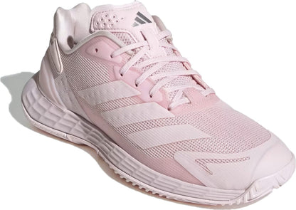 The adidas Defiant Speed 2 Womens Tennis Shoes in Distilled Pink are lightweight athletic shoes ideal for women’s tennis. They feature signature white adidas stripes, a breathable mesh upper, textured sole, and laces. The adidas logo appears on the tongue. Modeled after the Defiant Speed 2 silhouette, this shoe is shown angled slightly to the left on a clean white background.