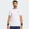 A man with short dark hair and a beard wears an adidas Climacool+ Airchill Freelift Mens Tennis T-Shirt in white, paired with navy shorts and black adidas wristbands, standing facing forward against a plain light background.