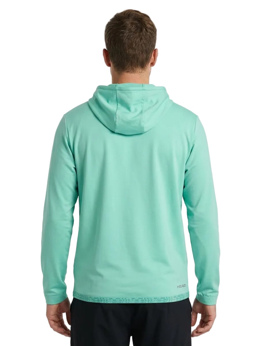 A man wearing a light turquoise HEAD Topspin Mens Tennis Hoodie - TQXU and black pants is standing with his back to the camera against a white background. This HEAD hoodie combines style and comfort, making it ideal for active days.