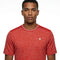 A man stands against a plain white background, looking directly at the camera with a neutral expression, wearing the K-Swiss Tac Hypercourt Tennis T-Shirt in Lollipop Melange—a comfortable, short-sleeve sportswear top featuring a small white K-Swiss logo.