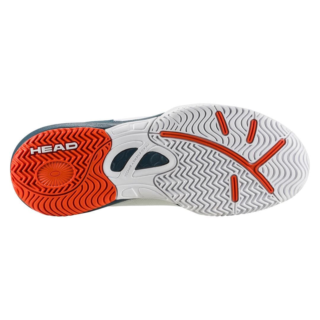 The image features the sole of the HEAD Sprint 3.5 Junior Tennis Shoes in a white and orange pattern. The brand name "HEAD" is embossed in orange, and the design includes various textures and grooves for improved grip. Crafted with breathable mesh, these lightweight shoes are designed to provide optimal comfort and performance on the court.
