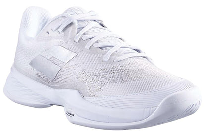 Introducing the Babolat Jet Mach 3 All Court Men's Tennis Shoes in White/Silver—an athletic tennis shoe featuring a mesh upper, white laces, and a white sole with textured detailing. Subtle design accents adorn the sides, while enhanced shock absorption ensures comfort during play.