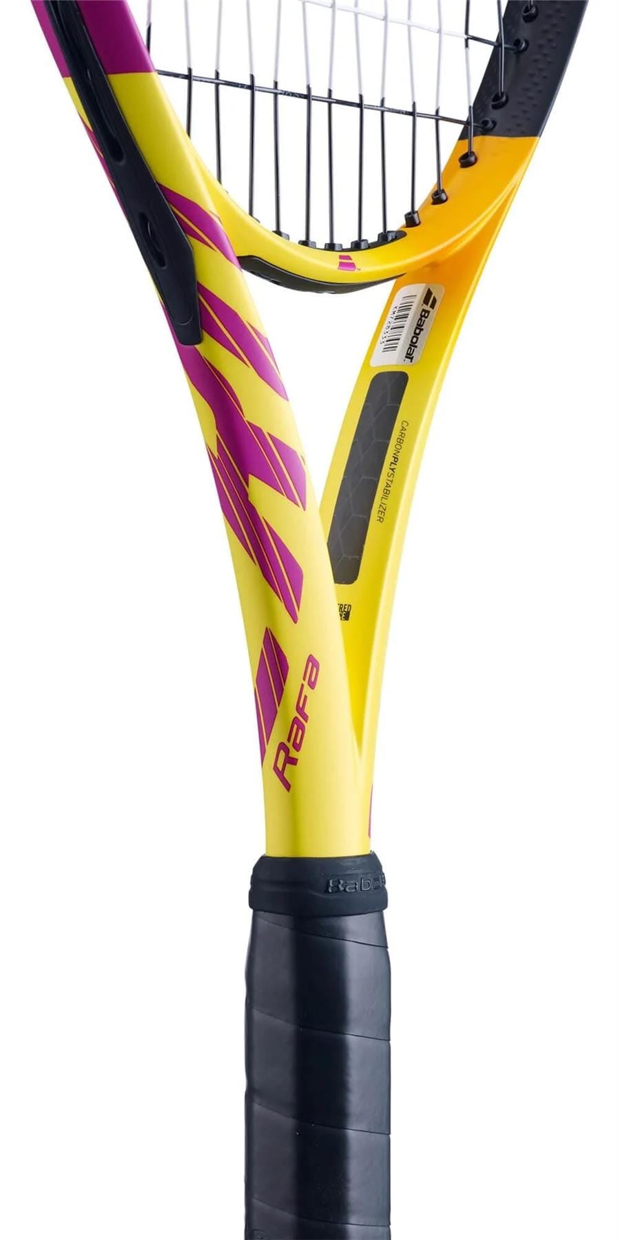 A close-up of a Babolat Pure Aero RAFA Team tennis racket showcases a striking yellow, orange, and purple design. The handle is wrapped in black grip tape to enhance spin generation, and the name "Rafa" is prominently displayed on the shaft. The top reveals part of the frame and strings.