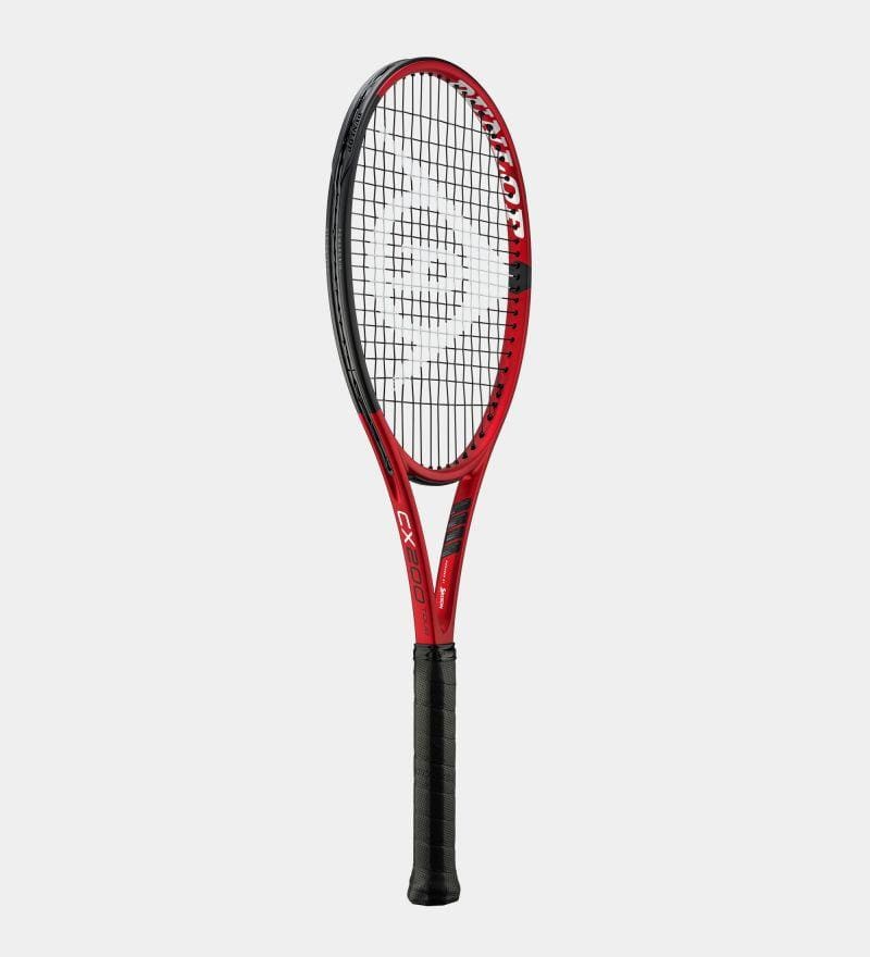 The Dunlop CX200 Tour 16x19 310g Tennis Racket, featuring a red and black color scheme with a compact racket head and a black grip, showcases an open 16x19 stringing pattern. A circular logo is positioned in the center of the string bed. The racket is displayed upright against a plain white background.