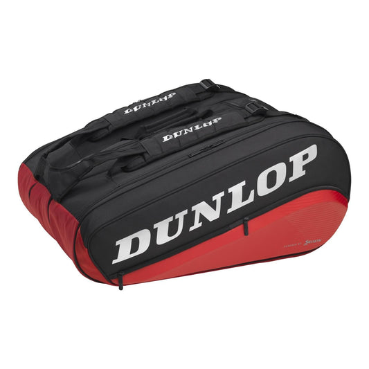 The Dunlop CX Performance 12 Racket Thermo Tennis Bag, available in a striking black and red color scheme, features an aerodynamic design and prominently displays the Dunlop logo in white. It is designed to hold up to 12 rackets and includes two handles along with a zipper for convenient carrying.