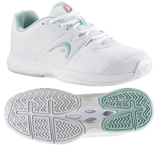 A pair of HEAD Revolt Court women's tennis shoes in white and grey. The top shoe is displayed from the side, featuring the HEAD logo, while the bottom shoe showcases the sole's intricate traction pattern. Experience lightweight comfort engineered to boost your performance both on and off the court.