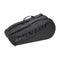 A Dunlop CX Club 6 Racket Tennis Bag in black, equipped with zippers and comfortable shoulder straps, prominently displaying the brand name "DUNLOP" on the side. This bag is crafted for optimal racket storage and to carry all your essential tennis gear.