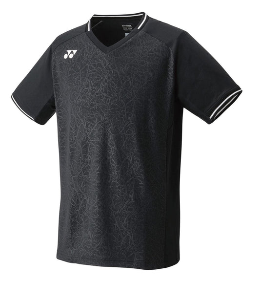The Yonex 10518 Men's T-Shirt in black showcases a subtle leafy pattern and short sleeves. It features a V-neck with white piping along the edges and includes VERYCOOL technology with an antistatic finish. A small white logo is displayed on one side of the chest.