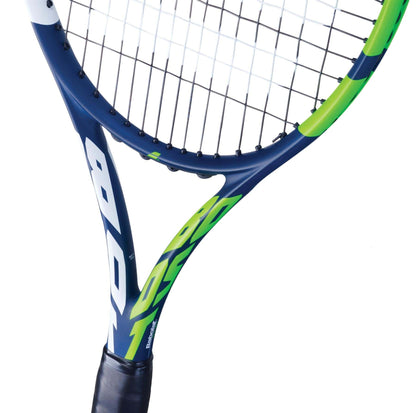 Close-up of the Babolat Boost Drive Tennis Racket, featuring a dark blue and green color scheme on its graphite frame. The tightly woven strings are visible along with part of the handle, and the design is accentuated by bold white numbers and letters. The background is white.