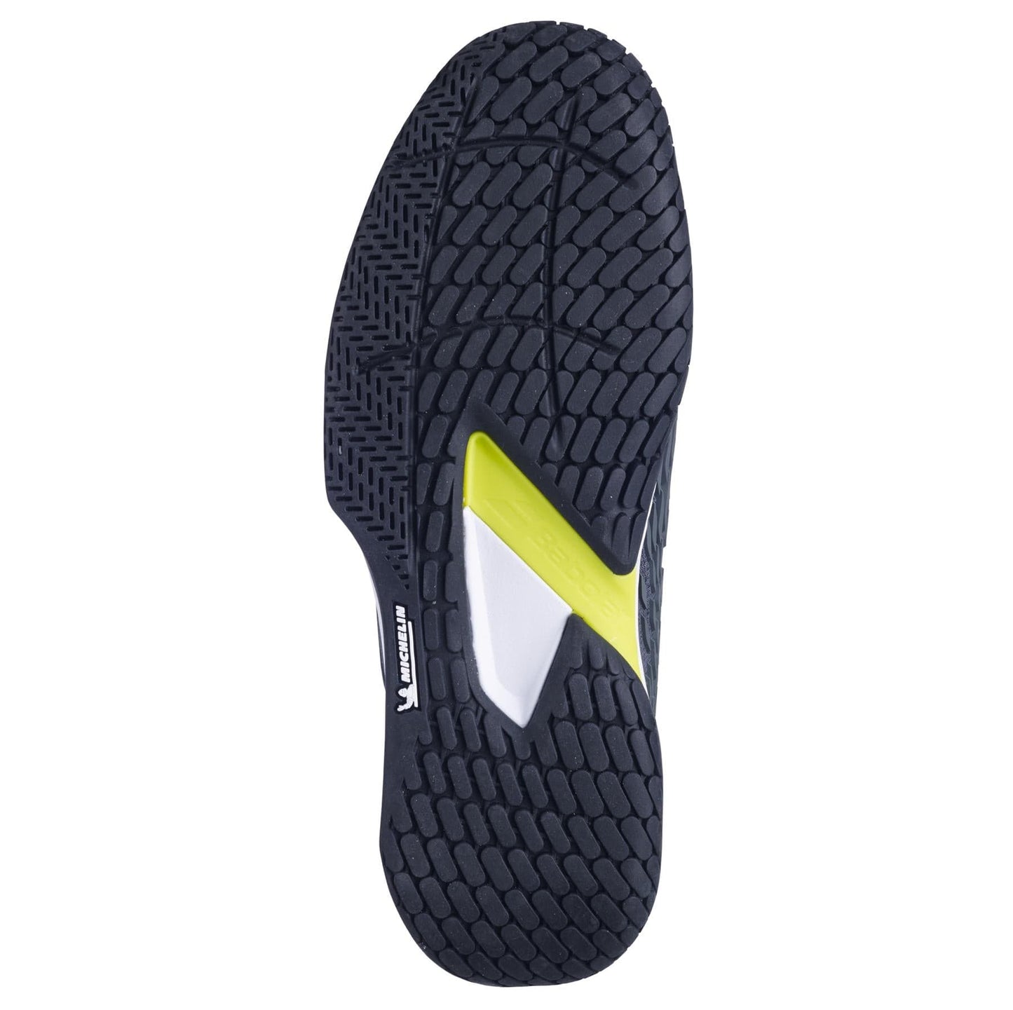 The image highlights the sole of a tennis shoe featuring a textured black tread pattern, with a striking yellow and white detail at its core, similar to the Babolat Propulse Fury 3 All Court Men's Tennis Shoes in Grey/Aero. These shoes ensure durability and traction thanks to their Power Belt feature.