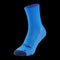 Displayed against a black background is the Babolat Pro 360 Men's Sock in Drive Blue, featuring a deep blue toe and heel. Engineered with varying textures and ribbed sections, this sock includes underfoot cushioning for enhanced performance and comfort. The Fiberdry technology ensures optimal breathability.