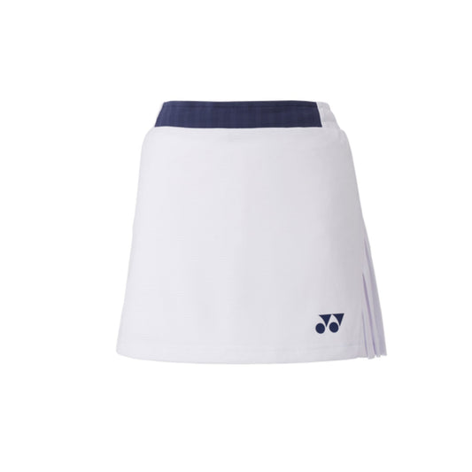 The Yonex 26094 Women's Skort from Yonex boasts a sleek white design with a navy waistband and a small navy logo near the hem. It features slight side pleats for style and includes UV reduction for enhanced comfort, set against its plain white background.