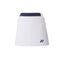 The Yonex 26094 Women's Skort from Yonex boasts a sleek white design with a navy waistband and a small navy logo near the hem. It features slight side pleats for style and includes UV reduction for enhanced comfort, set against its plain white background.