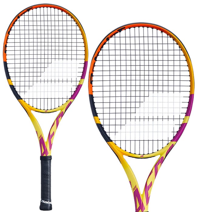 Two vividly designed Babolat Pure Aero RAFA Junior 26 Tennis Rackets, featuring accents in orange, yellow, and purple, highlight a dynamic aesthetic. These rackets incorporate spin technology and are equipped with a black grip and a precise mesh string pattern for outstanding performance.