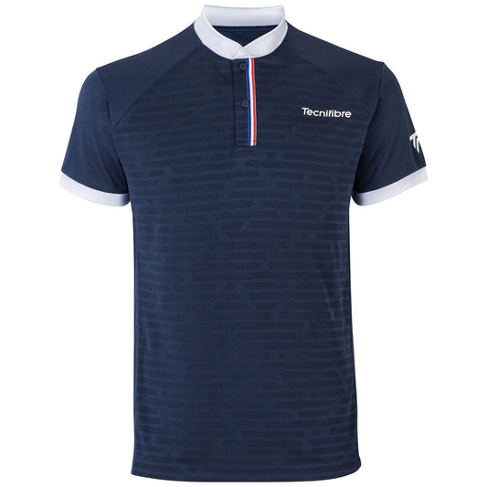 The Tecnifibre Men's F3 Tennis Polo Shirt - Marine Blue showcases a marine blue performance polyester fabric with a subtle pattern, accentuated by a white collar and sleeve cuffs. The buttoned neckline is adorned with red, white, and blue stripes, and the "Tecnifibre" logo is prominently displayed on the chest.