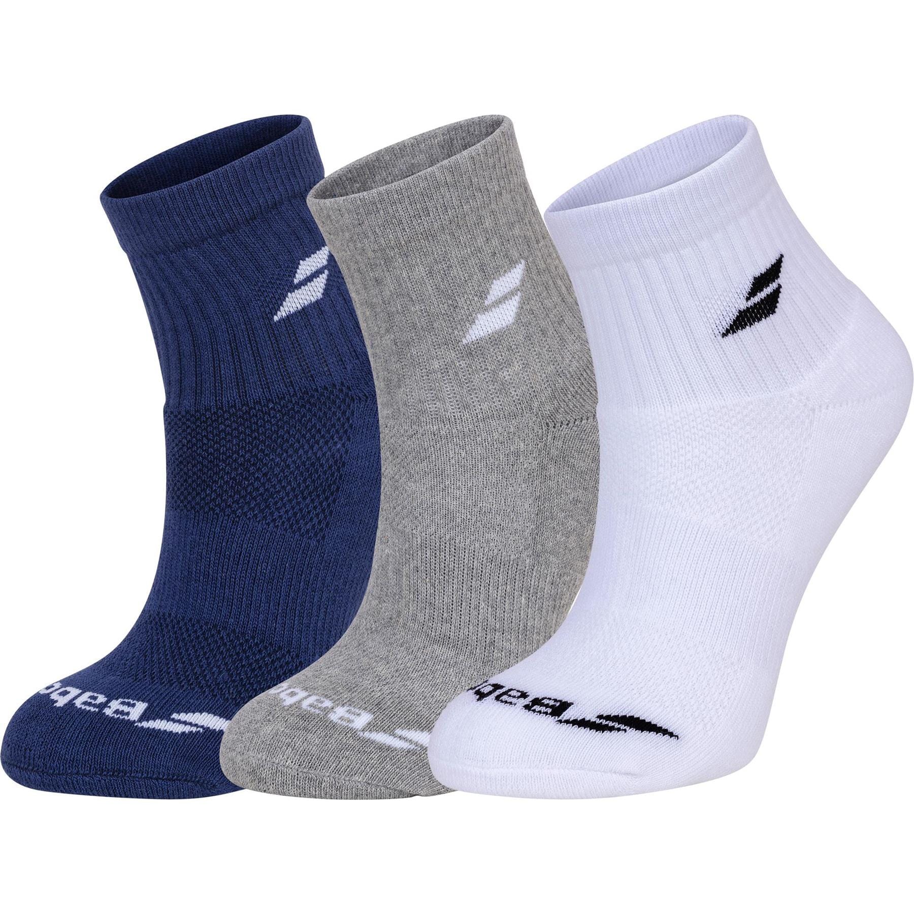 The Babolat Quarter Socks 3 Pack in white, blue, and grey offers optimal comfort, featuring a subtle logo near the top and across the toe of each pair. Designed for breathability, these socks are displayed upright side by side.