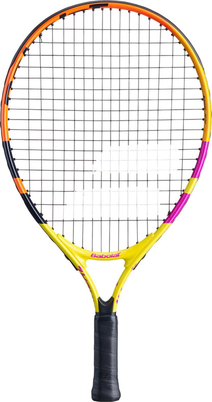 Presenting the Babolat Nadal Junior 21 Tennis Racket, tailored for young athletes and featuring a sleek black grip. Its frame boasts dynamic yellow, orange, and purple highlights. The strings are meticulously woven to boost performance, with the distinguished "Babolat" branding prominently displayed near the handle.