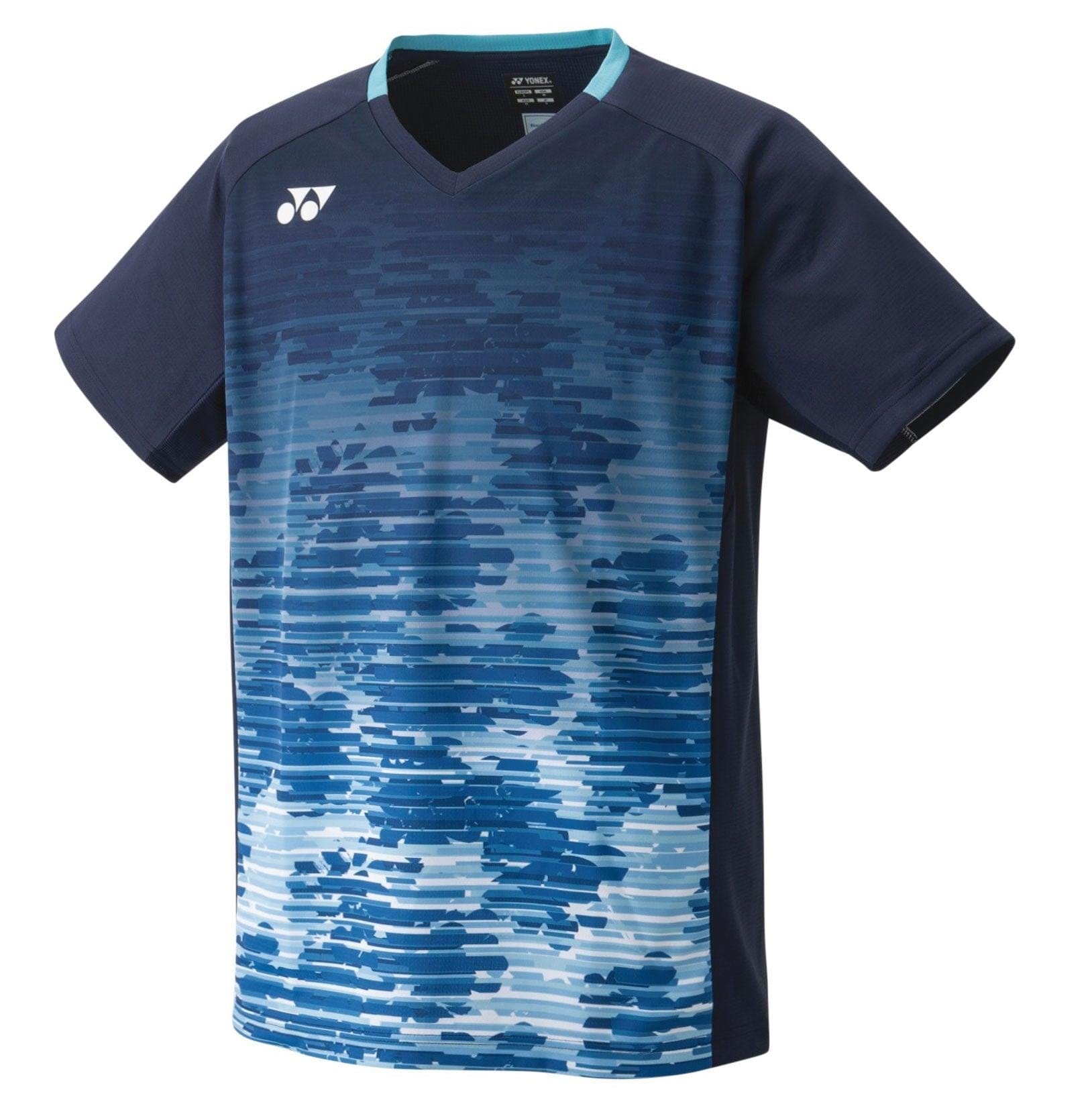 The Yonex 10505 Men's T-Shirt in Navy Blue exhibits a pixelated design with abstract horizontal lines in navy and light blue shades. It features short sleeves, a V-neck collar, and is equipped with advanced antistatic technology, making it both stylish and functional.