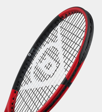 A close-up of the Dunlop CX200 Tour 16x19 310g Tennis Racket highlights its compact head and open 16x19 string pattern. The red and black frame with black strings features a white logo in the center, enriching its modern, sleek, and sporty look.