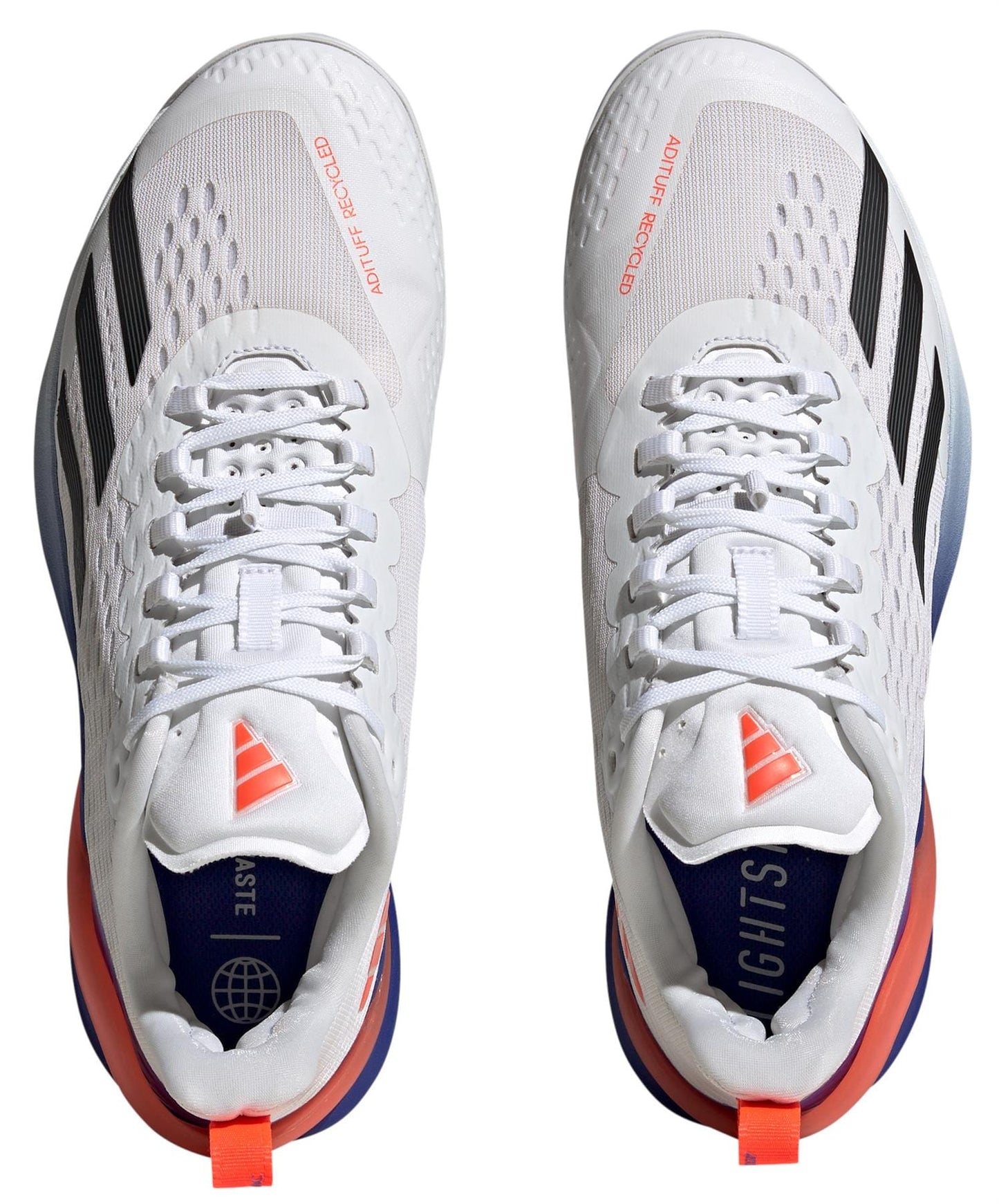 Top view of the adidas Adizero Cybersonic men's tennis shoes in Cloud White, Core Black, and Solar Red, made from recycled materials. The soles feature a distinctive blue and red design that highlights their innovative style. "END PLASTIC WASTE" is featured on the left shoe, while "ADIFOM RECYCLED" appears on the right.