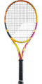 This eye-catching Babolat Pure Aero RAFA Team tennis racket boasts a yellow, orange, and purple frame. The handle is wrapped in black grip tape, ideal for enhancing spin generation. The Babolat brand logo is prominently displayed on the frame, while the strings are arranged in a standard grid pattern.