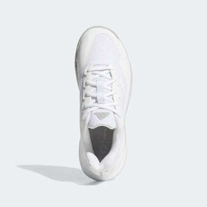 Top view of a single white adidas GameCourt 2 Women’s Tennis Shoe with a mesh upper and white laces on a light gray background. The shoe from adidas showcases a sleek, modern design, featuring a hard court outsole and a subtle logo on the tongue.
