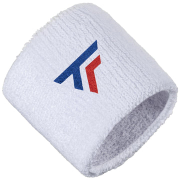 The Tecnifibre Tennis Wristband Sweatband 2 Pack in White, by the brand Tecnifibre, is crafted from soft cotton fabric and adorned with a stylized logo featuring blue and red diagonal stripes, making it ideal for absorbing sweat during intense matches.