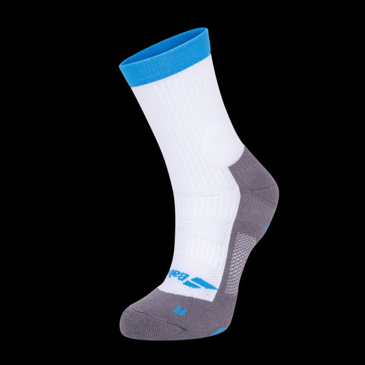Presented against a black background, the Babolat Pro 360 Men's Sock in White and Diva Blue showcases a blue cuff, white upper, and gray heel and toe. Designed for optimal comfort and support, it features underfoot cushioning, reinforced sections, and a stylish blue logo.